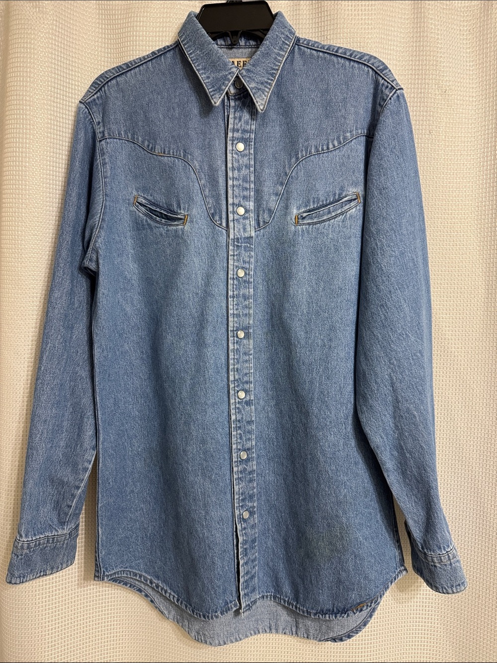 This is a Schaefer by Outfitters ranchwear long sleeve button down shirt. Size M